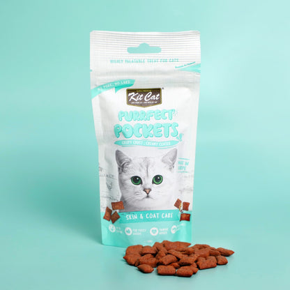 Kit Cat Purrfect Pockets Skin and Coat Care cat treats pouch with treats displayed in front