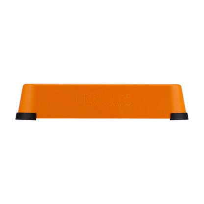 Side view of Orange LickiMat Keeper showing raised walls for extended feeding capacity and mess control