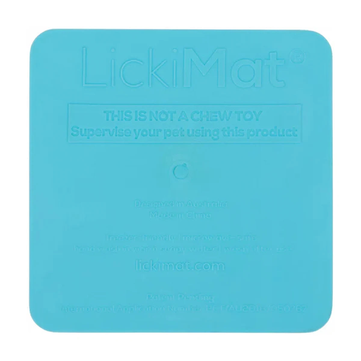 Back of LickiMat Kitty Cat turquoise showing authentic branding and care message
