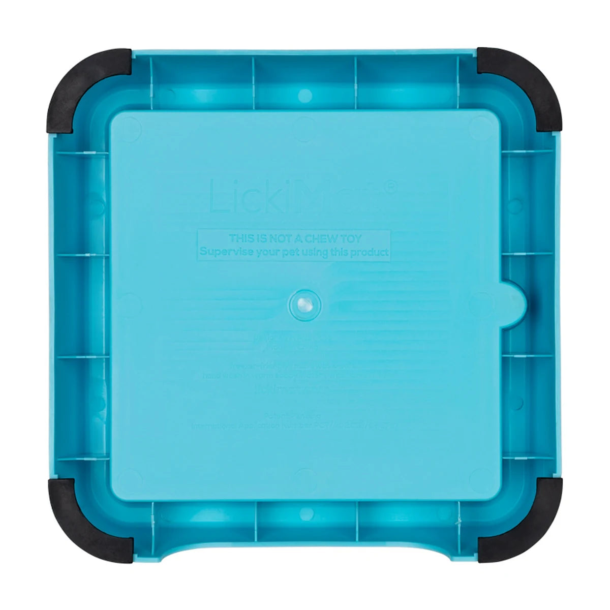 Bottom view of LickiMat Mini Keeper showing non-slip rubber feet, turquoise