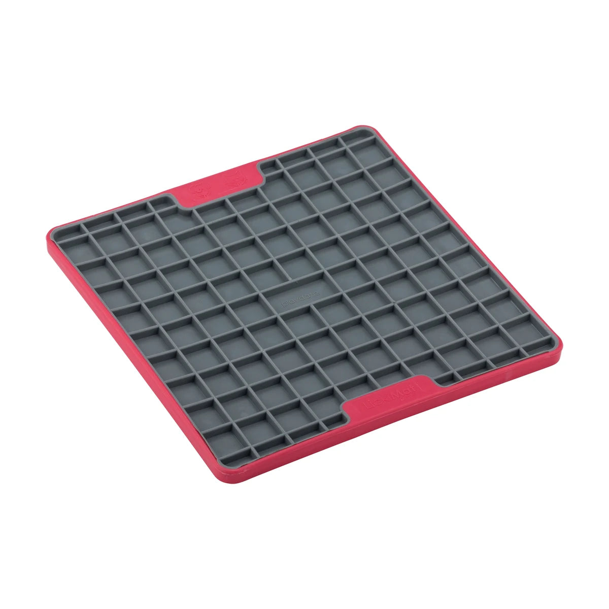Angled view of red LickiMat Playdate TUFF lick mat with square pattern texture