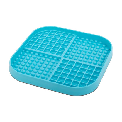LickiMat Slomo XL turquoise slow feeder dog mat angled view with pockets and nubs