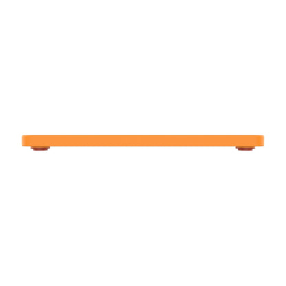 Side profile of LickiMat TUFF Pro Soother orange showing thickness and non slip feet