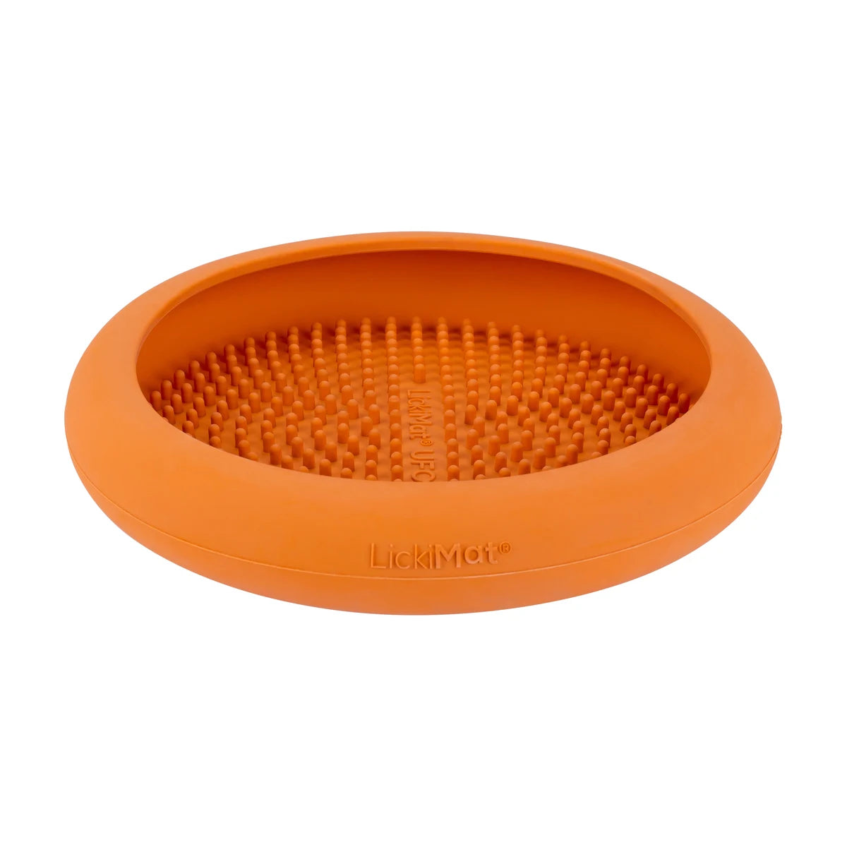 LickiMat UFO orange slow feeder dog lick mat angled view on white background