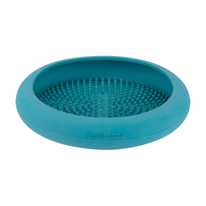 LickiMat UFO turquoise slow feeder dog lick mat angled view on white background