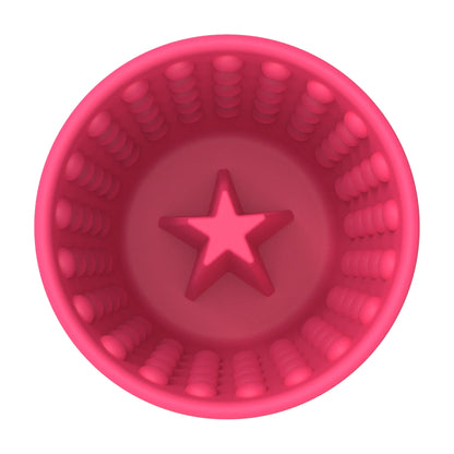 Inside top view of LickiMat Yoggie Pot in pink showing textured bumps and star base for licking enrichment.