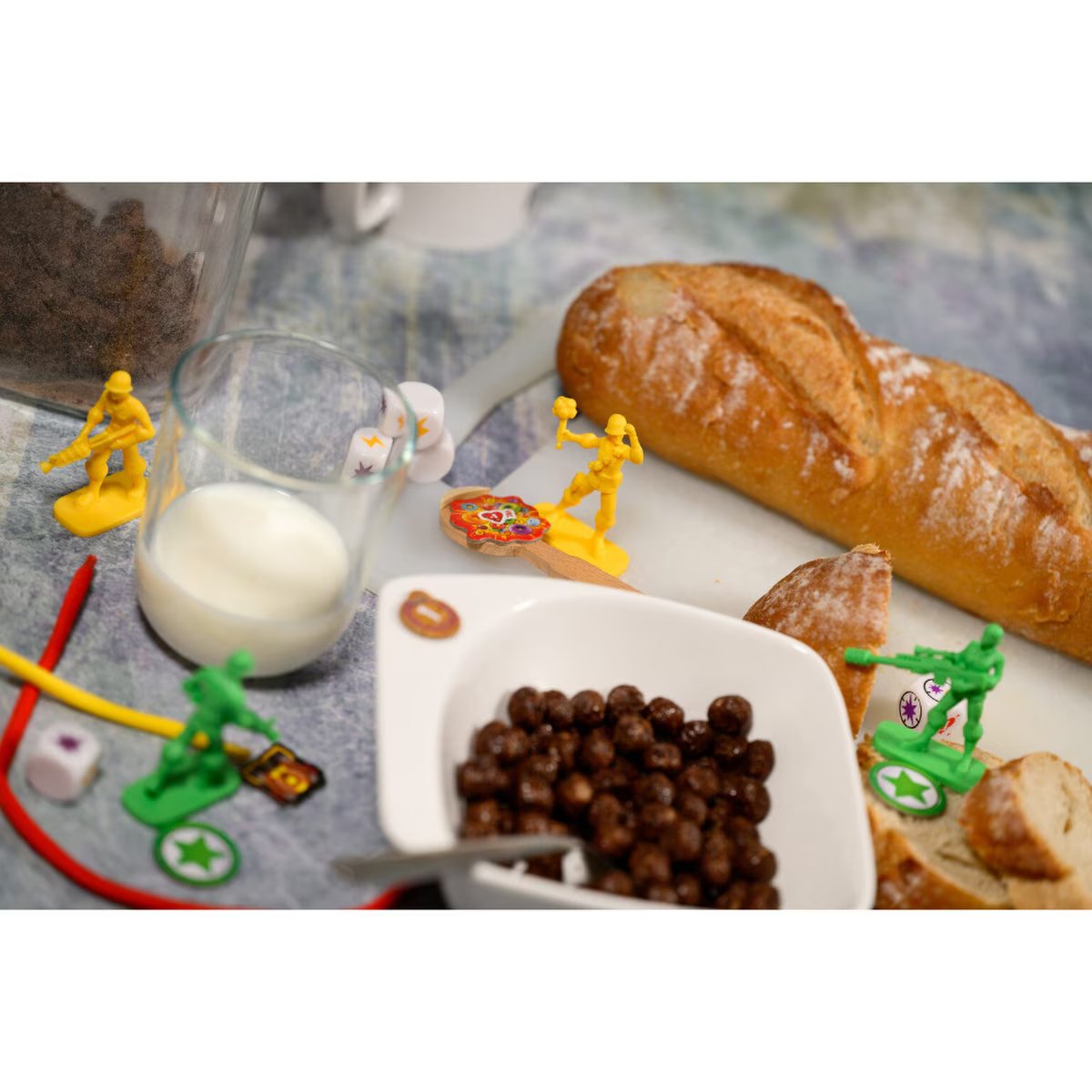Little Soldiers gameplay scene using household objects and food items as a creative battlefield for toy soldier miniatures