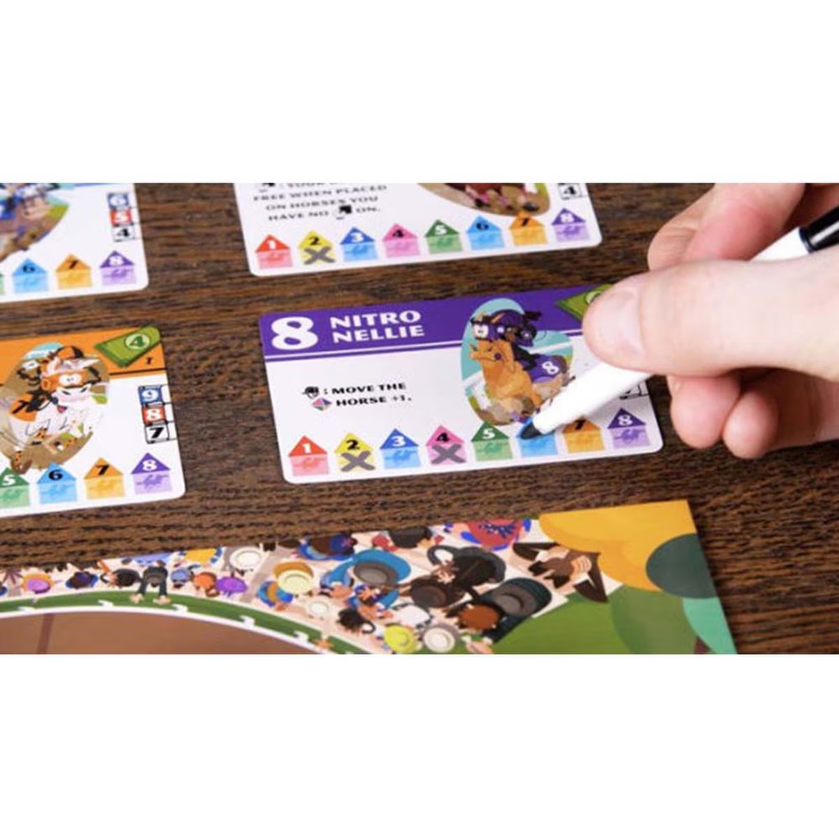 Long Shot The Dice Game player using a dry erase marker on a Horse Card during gameplay