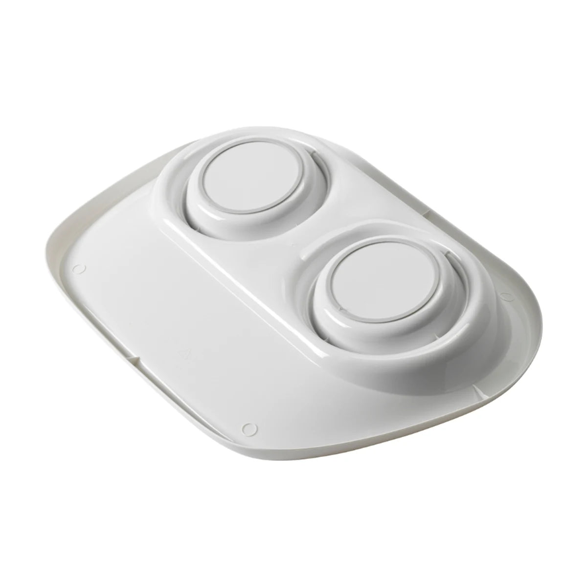 Underside view of the Moderna Tidy Diner double pet feeder showing the white tray base, two circular bowl holders and moulded construction.