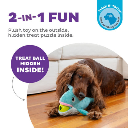 Dog playing with Nina Ottosson Big Mouthz whale plush puzzle toy with hidden treat ball inside