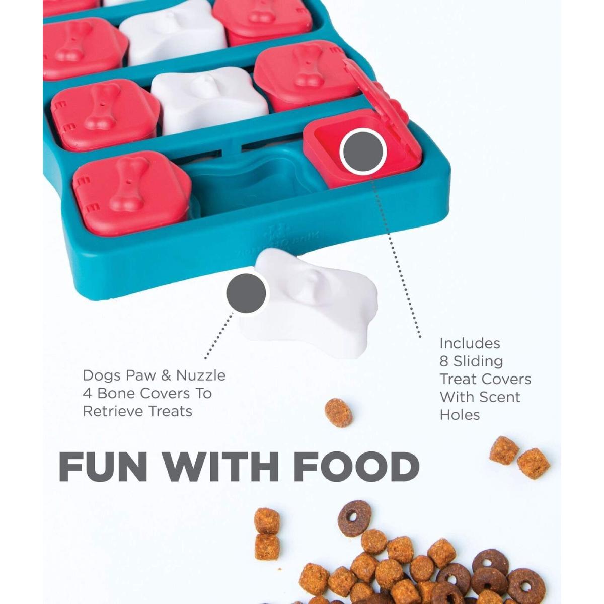 Nina Ottosson Dog Brick Blue features showing sliding treat covers and scent holes for food puzzle play