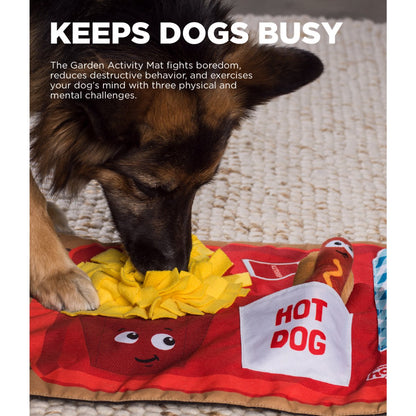 Dog sniffing the Nina Ottosson Fast Food Fun activity mat to find hidden treats during supervised enrichment play