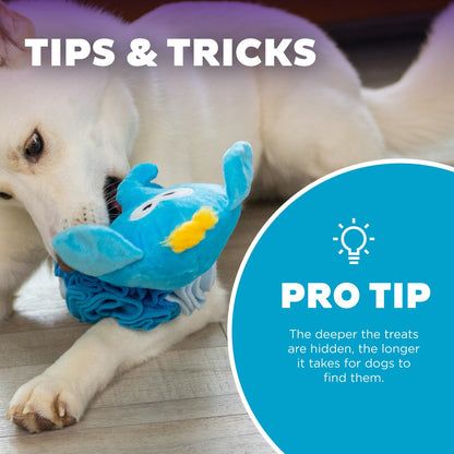 Dog using Nina Ottosson Stuff N Snuffle Elephant blue plush puzzle with treats hidden deeper for a longer challenge