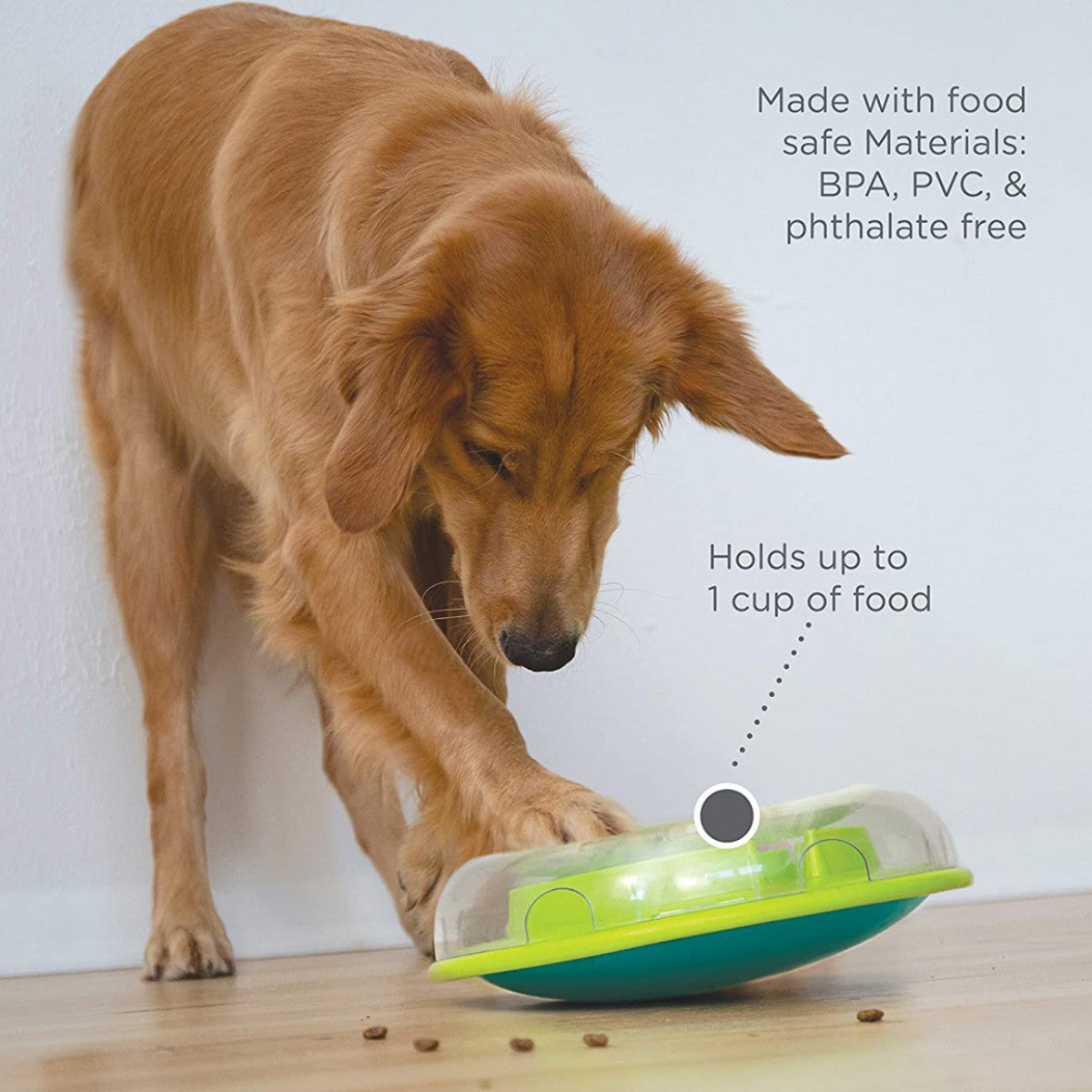 Dog pawing Wobble Bowl showing food safe materials and meal capacity