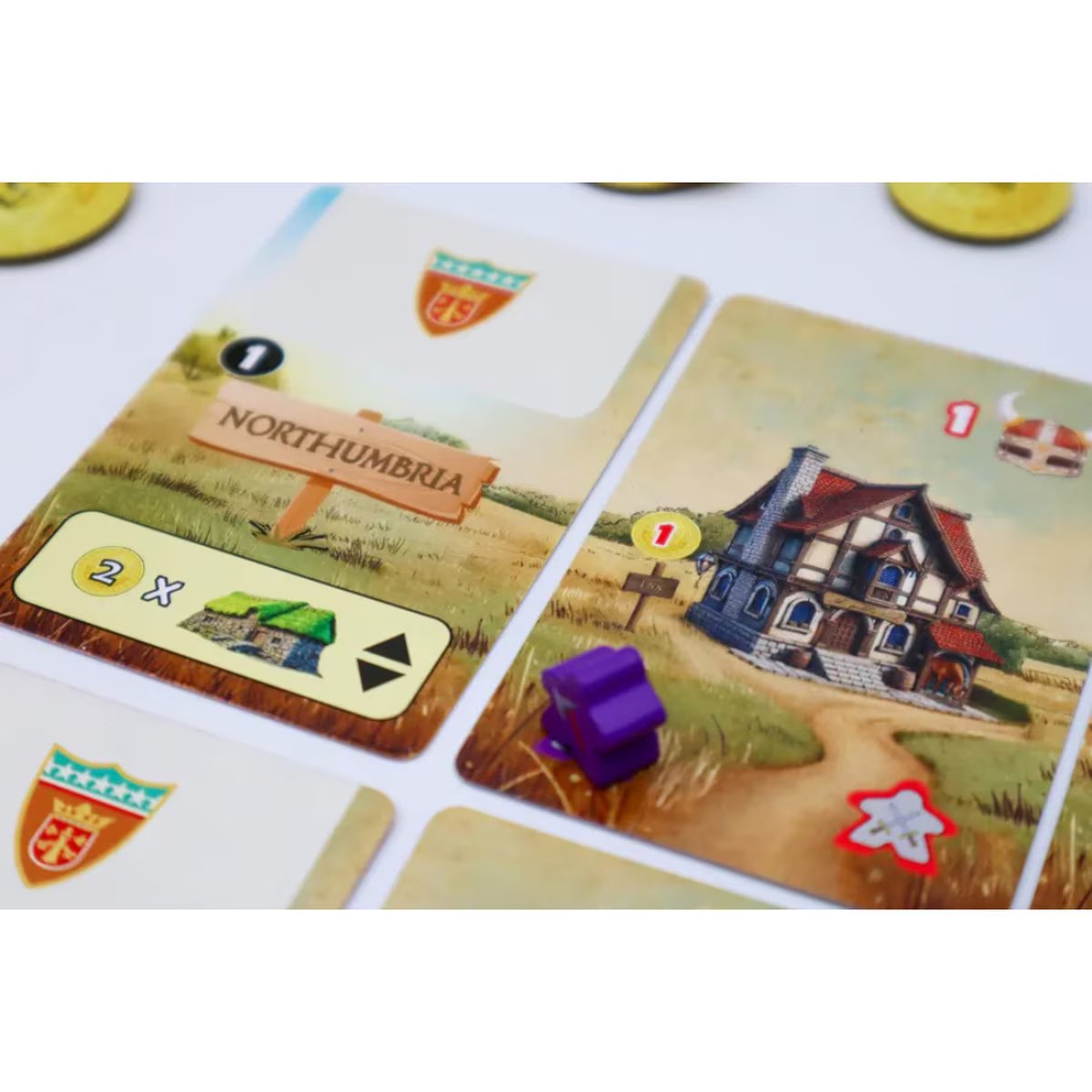 Norsewind kingdom cards close up with Northumbria card and player piece
