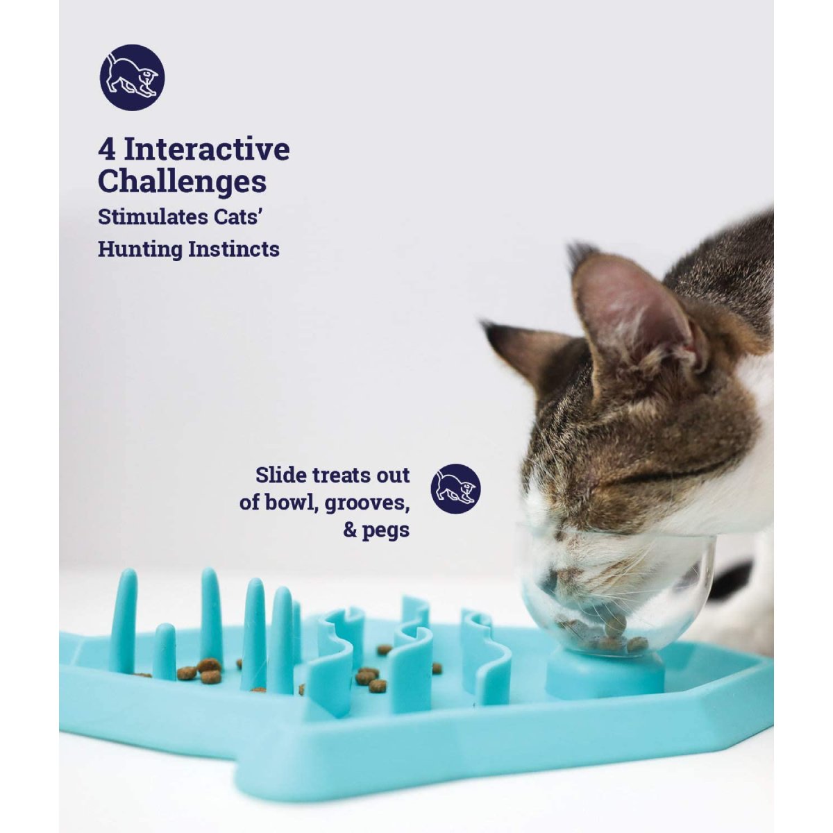 Cat using the bowl grooves and pegs on the Outward Hound Hunt 'n Snack Mat