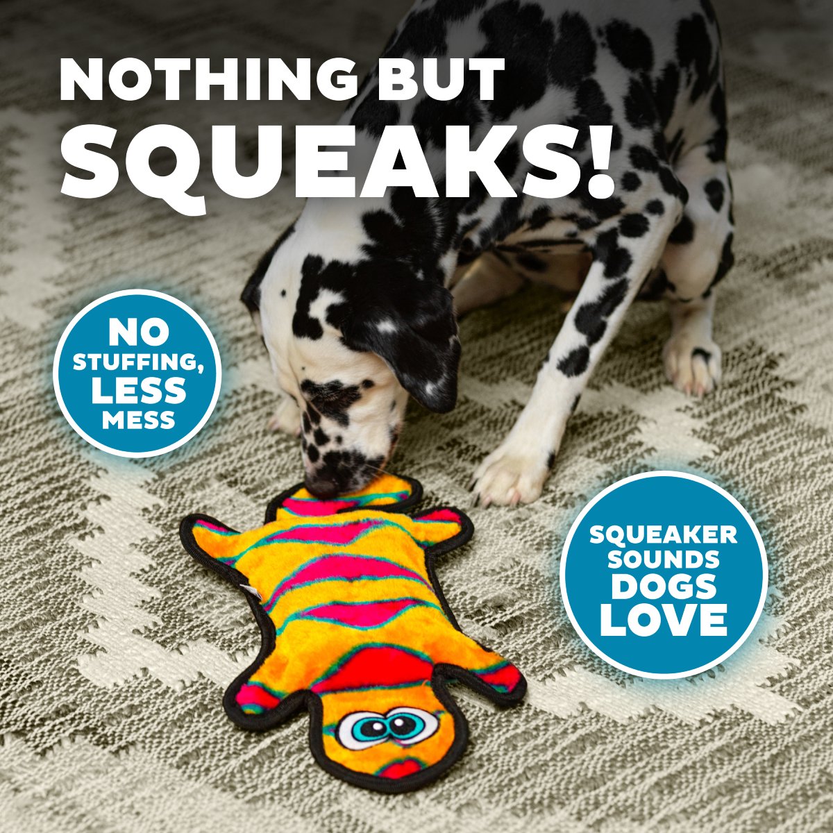 Dog playing with Outward Hound Durablez Gecko Orange Large stuffing-free squeaky plush toy