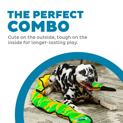 Dalmatian with Outward Hound Durablez Snake Green XXL plush dog toy during indoor play