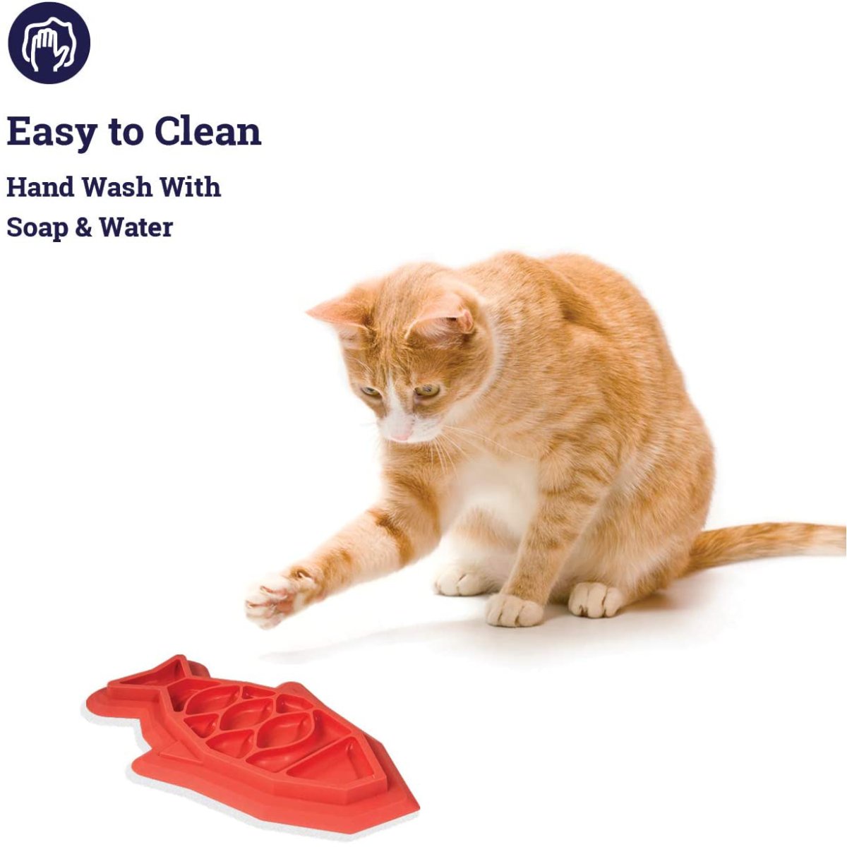 Cat with Outward Hound Fishie Fun Feed Mat showing easy-clean design