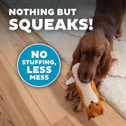 Dog playing with stuffing-free Petstages Big Squeak Fox plush toy