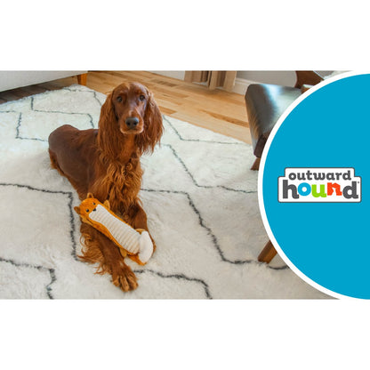 Dog sitting indoors with Petstages Stuffing-Free Big Squeak Fox toy