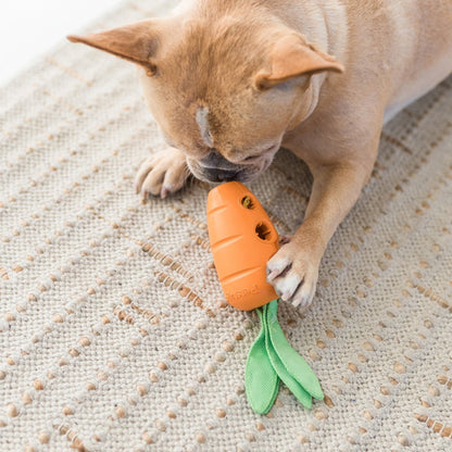Petstages Carrot Stuffer dog toy filled with treats showing three openings for interactive snack time play