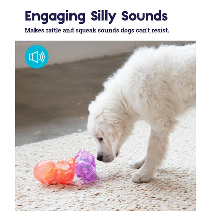 Puppy playing with Petstages Rattle Treat and Squeak Monkey dog toy with engaging rattle and squeak sounds