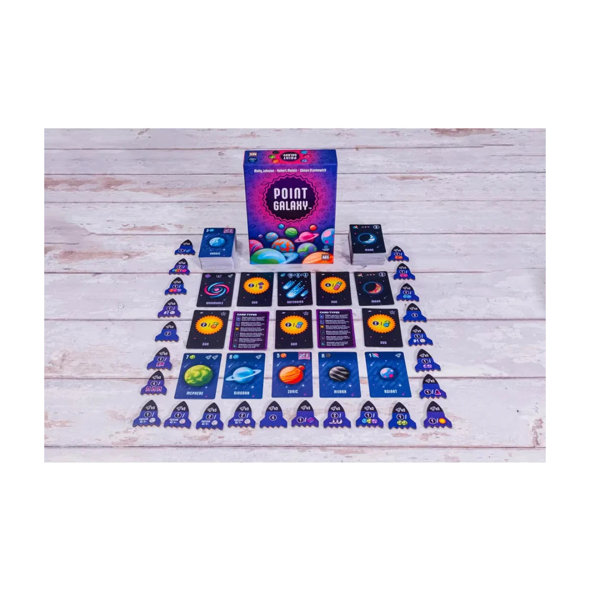 Point Galaxy card game full layout with box, cards, rockets, and space-themed components