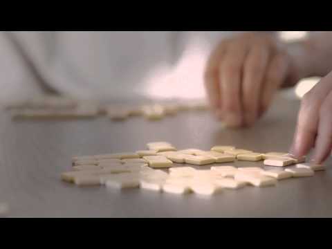 Bananagrams how to play video showing fast-paced family word game setup and gameplay
