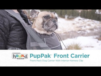 Outward Hound PupPak Front Carrier in use with a small dog, showing the grey hands-free dog carrier and adjustable straps