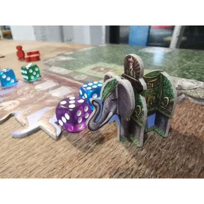 Rajas of the Ganges board game starting player elephant with colourful dice during gameplay