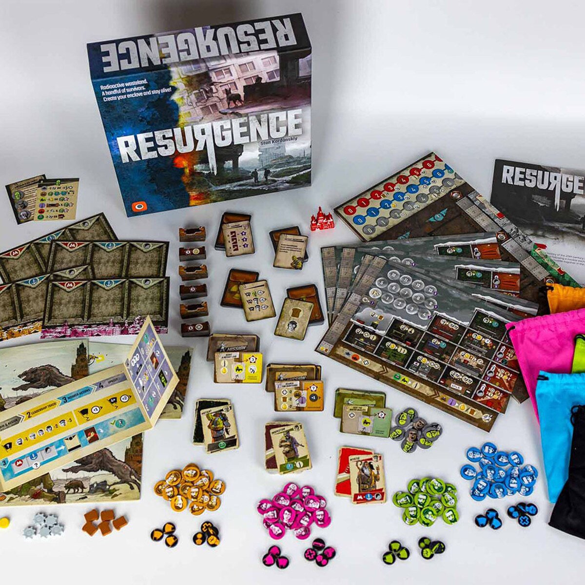 Resurgence board game components with cards player boards tokens and draw bags
