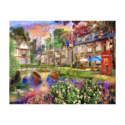 RGS Cotswold Way 2000 piece jigsaw puzzle artwork studio image sunset village scene with bridge swans and flowers