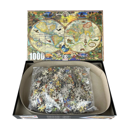 Open box view of RGS Map of the World 1000 piece jigsaw puzzle showing pieces inside packaging