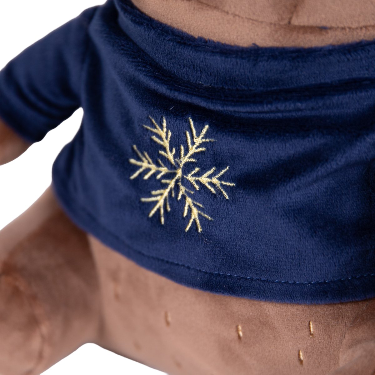 Close-up of Rosewood Bart Bear Christmas dog toy showing the gold embroidered snowflake on its soft navy blue jumper.