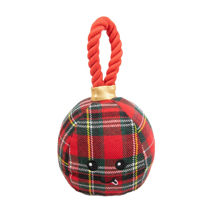Rosewood Bauble Buddies tartan Christmas plush dog toy with a red, green and black checked design, embroidered smiling face and red rope handle.