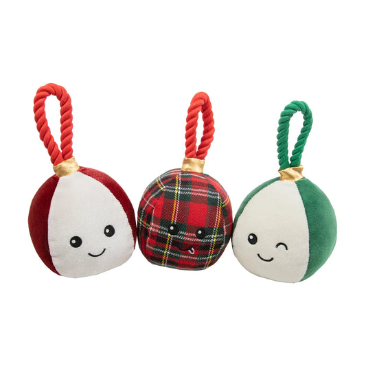 Three assorted Rosewood Bauble Buddies squeaky plush Christmas dog toy designs in red and white, festive tartan and green and white, each with a rope handle.