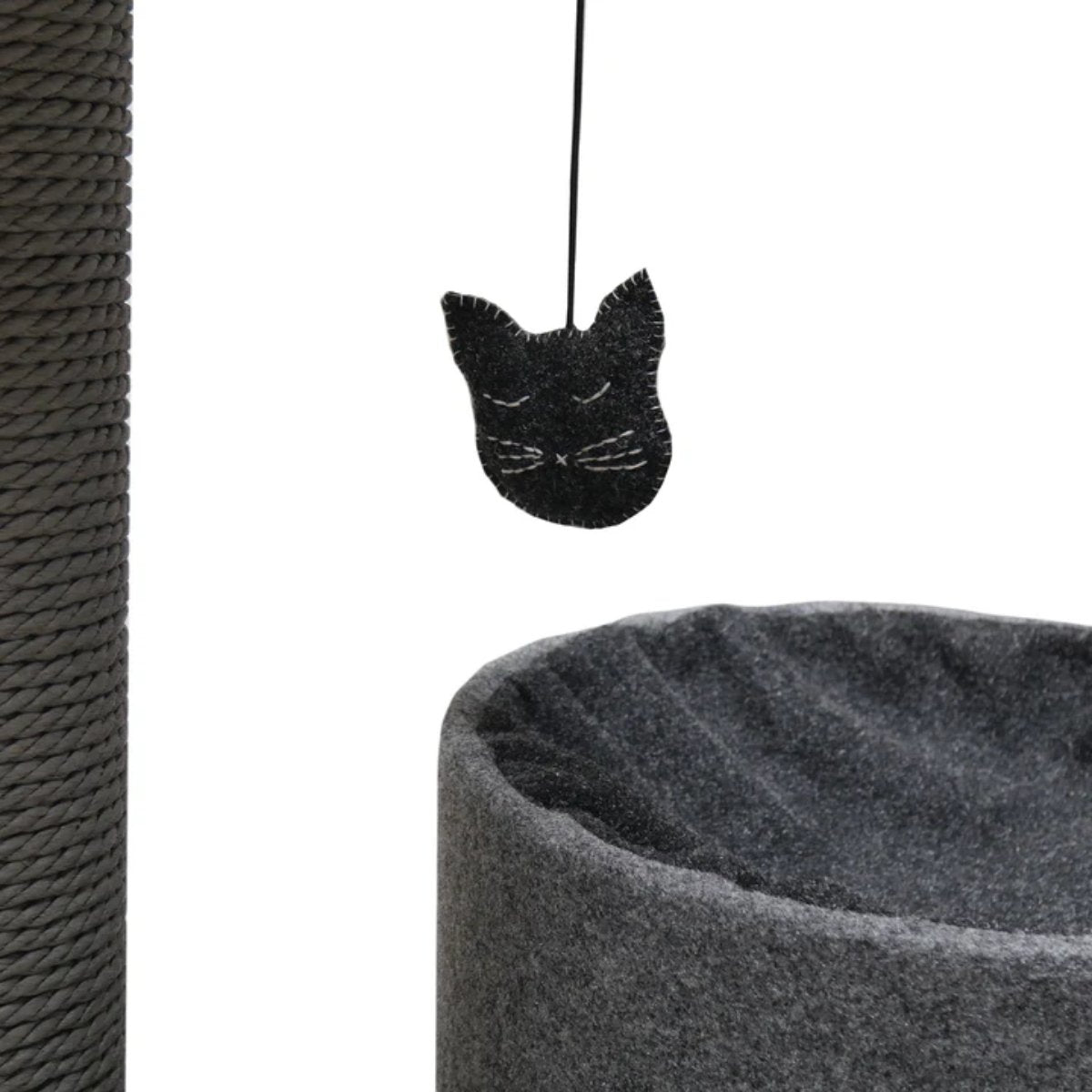 Close-up of the hanging cat-shaped teaser beside the Rosewood charcoal scratching post and cat house