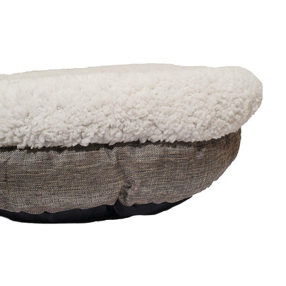 Close-up of Rosewood Deep Tweed Teddy Bear Round Pet Bed showing the thick cream teddy bear fleece rim, textured grey tweed outer fabric and dark base edging.