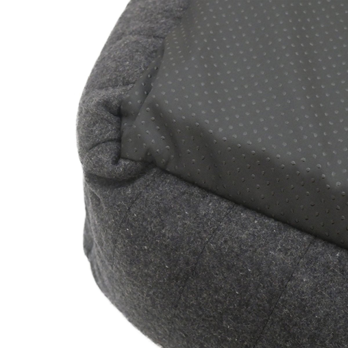 Close-up of the Rosewood Grey Felt Memory Foam Dog Bed showing its dark textured underside and grey felt edge.
