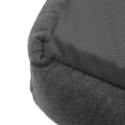 Close-up of the Rosewood Grey Felt Memory Foam Dog Bed showing its dark textured underside and grey felt edge.