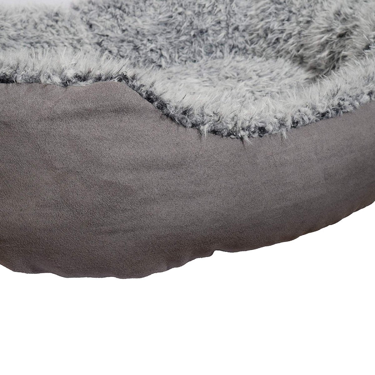 Close-up of Rosewood Grey Lion Faux Suede Oval Dog Bed showing the smooth grey faux suede exterior meeting the thick, fluffy grey plush lining.