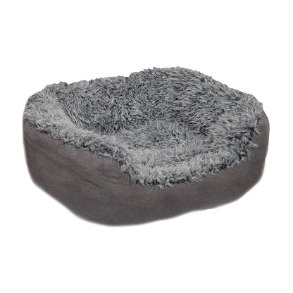 Rosewood Grey Lion Faux Suede Oval Dog Bed with luxurious fluffy grey plush lining, raised oval sides and smooth grey faux suede exterior on a white background.