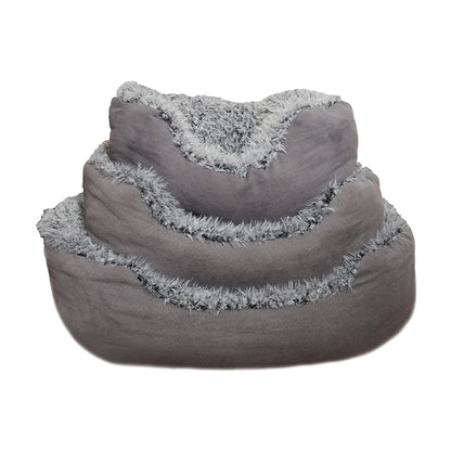 Three Rosewood Grey Lion Faux Suede Oval Dog Beds stacked by size, showing the grey faux suede outer sides and fluffy lion-style plush lining.