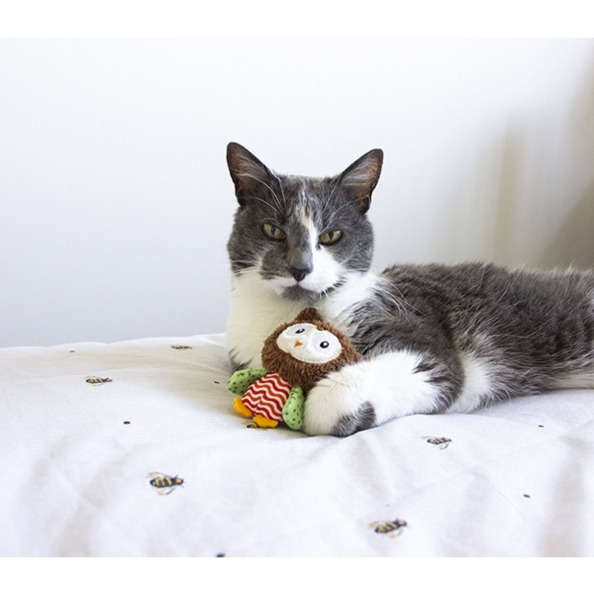 Cat cuddling with Rosewood Little Nippers Boggle Owl catnip plush toy