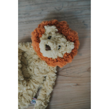 Rosewood My Dog Lion plush dog toy resting on the floor showing its soft cream and orange design