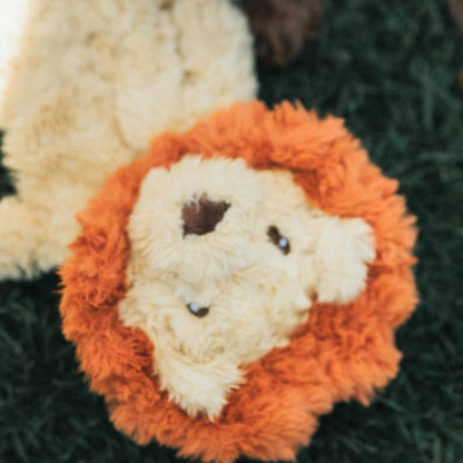 Close-up of Rosewood My Dog Lion plush dog toy with soft cream face and orange mane