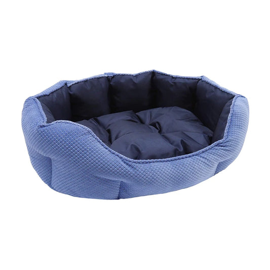 Rosewood Quilted Navy Water-Resistant Dog Bed with soft padded inner mattress and raised sides, shown on a white background.
