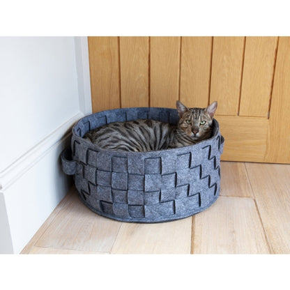 Cat relaxing in the Rosewood round silver felt pet bed indoors