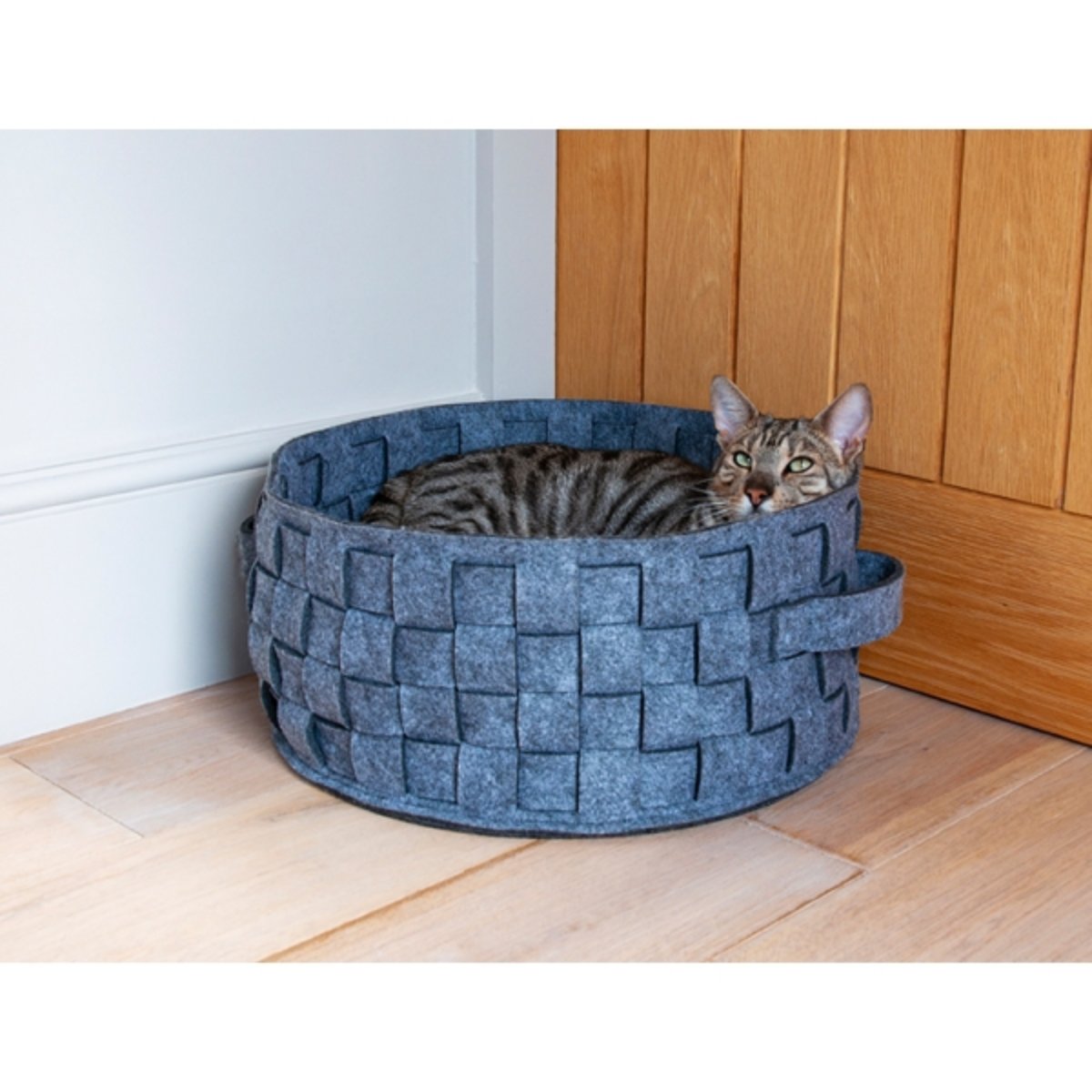 Cat resting inside the Rosewood silver felt and faux fur pet bed